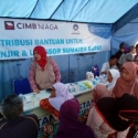 Dompet Peduli Ummat dan CIMB Niaga Syariah Bantu Korban Banjir Solok