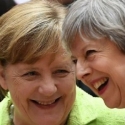 Merkel: Jaminan Inggris Pada Warga Uni Eropa Adalah Awal Yang Baik