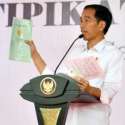 Jokowi Disambut Hujan Deras Saat Acara Pembagian Sertifikat Tanah Warga Jaksel