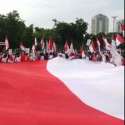 Tanamkan Cinta Tanah Air, GJI Kibarkan Seribu Bendera Merah Putih