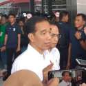 Jokowi Ingatkan Ojol Jangan Gunakan HP Sambil Berkendara