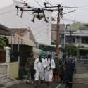 Cegah Sebaran Covid-19, Pemprov DKI Semprot Disinfektan Pakai Drone Dan <i>Spray</i> Darat