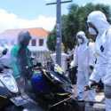 Langsung Dipantau Gubernur Jatim, Ratusan Ojol Disemprot Disinfektan