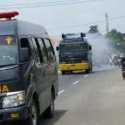 Gunakan Water Cannon, Polres Serang Semprot Jalanan Dengan Disinfektan