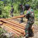 Lakukan Patroli Rutin, Satgas Pamtas Kapuas Amankan Puluhan Kayu Hasil Ilegal Logging