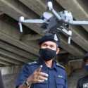 Hadapi Gelombang Ketiga Covid-19, Polisi Di Negara Bagian Malaysia Ini Gunakan Drone Pengukur Suhu Tubuh