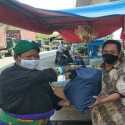 Bareng Santri, Polisi Bagikan Bansos PPKM Level 4 Ke Masyarakat