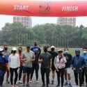 Ditemani Gerimis, Peserta BNI-UI Half Marathon 2021 Tetap Berlari dengan Semangat