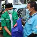 Bareng GP Ansor, Polres Pelabuhan Tanjung Priok Bagikan Sembako ke Sopir Angkot dan Nelayan