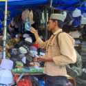 Kisah Pilu Penjual Peci di Pasar Aceh