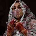 Sambut Iduladha, Perempuan Pakistan Hiasi Tangan dengan Henna dan Gelang