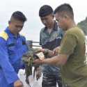 Mengangkut Sampah Laut