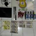 Polisi Tangkap Dua Tersangka Kasus Uang Palsu, Amankan Printer dan Ribuan Lembar Dolar
