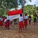 Anak Papua Kibarkan Merah Putih