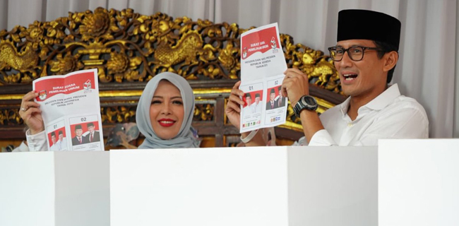 Sandi Dan Istri Di Bilik Suara