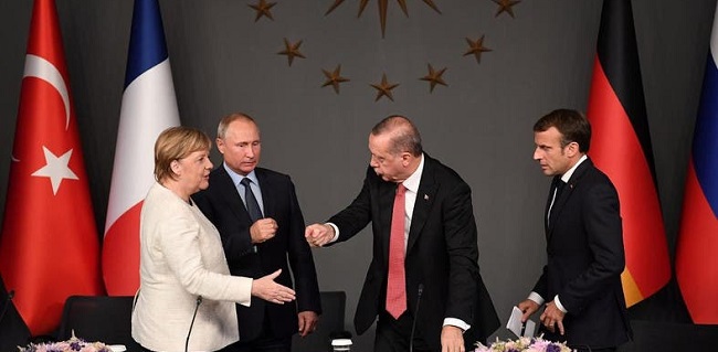 Via Telepon, Macron Dan Merkel Minta Bertemu Dengan Putin Dan Erdogan