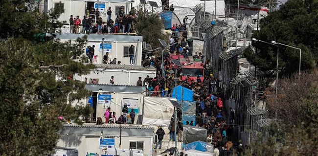Yunani Karantina Kamp Pengungsi Setelah 20 Migran Dinyatakan Positif Covid-19