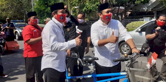 Pilkada Ngawi, Pasangan OK Pilih <i>Ngontel</i> Saat Daftar Ke KPU