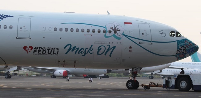 Ajak Masyarakat Patuhi 3M, Garuda Indonesia Dan AGP Pasang Masker Tema Nusantara Di Armada A330-300