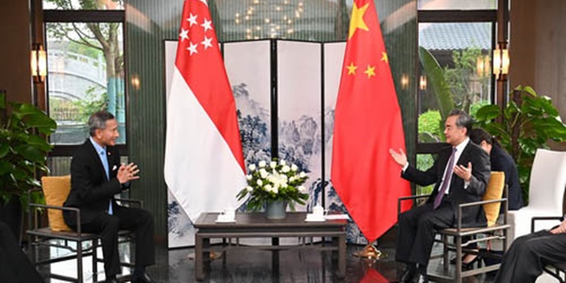 Terima Kunjungan Menteri Luar Negeri Singapura, Wang Yi Bahas Covid Hingga Myanmar