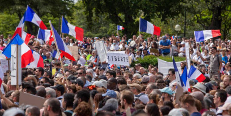 Protes Anti-Vaksin Meluas Di Perancis, Macron: Demonstrasi Tidak Membuat Virus Corona Menghilang