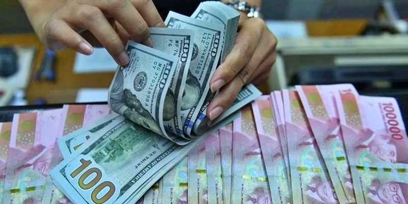 IHSG Cerah, Rupiah Tertekan ke Rp16.339 Sore Ini