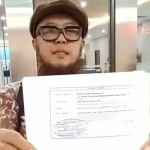 Direktur Eksekutif Studi Demokrasi Rakyat (SDR), Hari Purwanto melaporkan dugaan fitnah terhadap Megawati Soekarnoputri. (Foto: Dok. Pribadi)