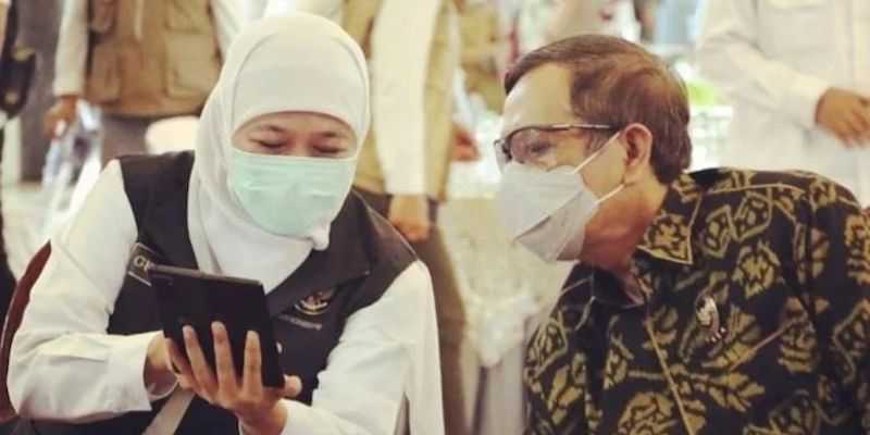 Menko Polhukam Mahfud MD kala bertemu Gubernur Jawa Timur Khofifah/Net