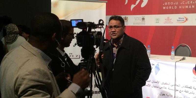 Teguh Santosa saat menjadi pembicara dalam sebuah seminar internasional mengenai HAM di Marakesh, Maroko, 2014.